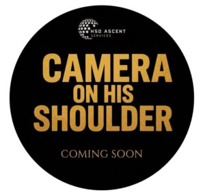 Camera On His Shoulder